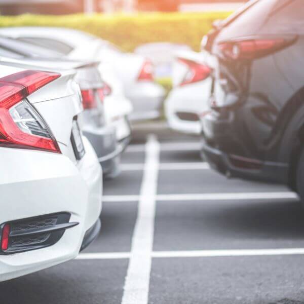 cars parked back to back in parking lot