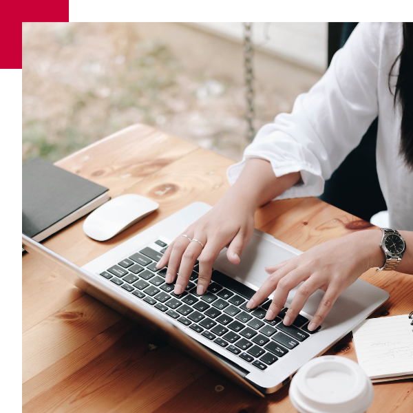 Person typing on computer